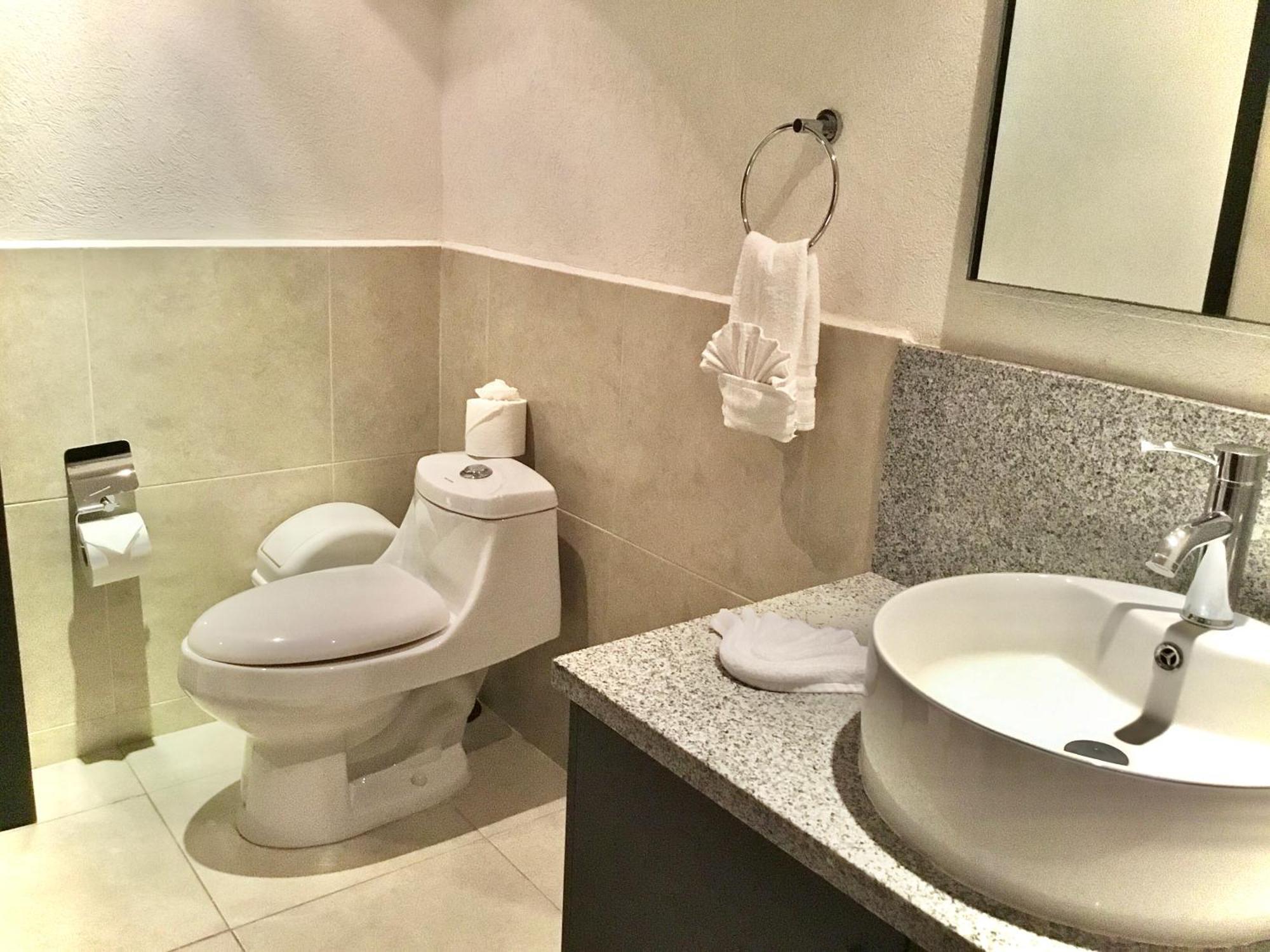 Apartamentos Grand Venetian Пуэрто-Вальярта Номер фото