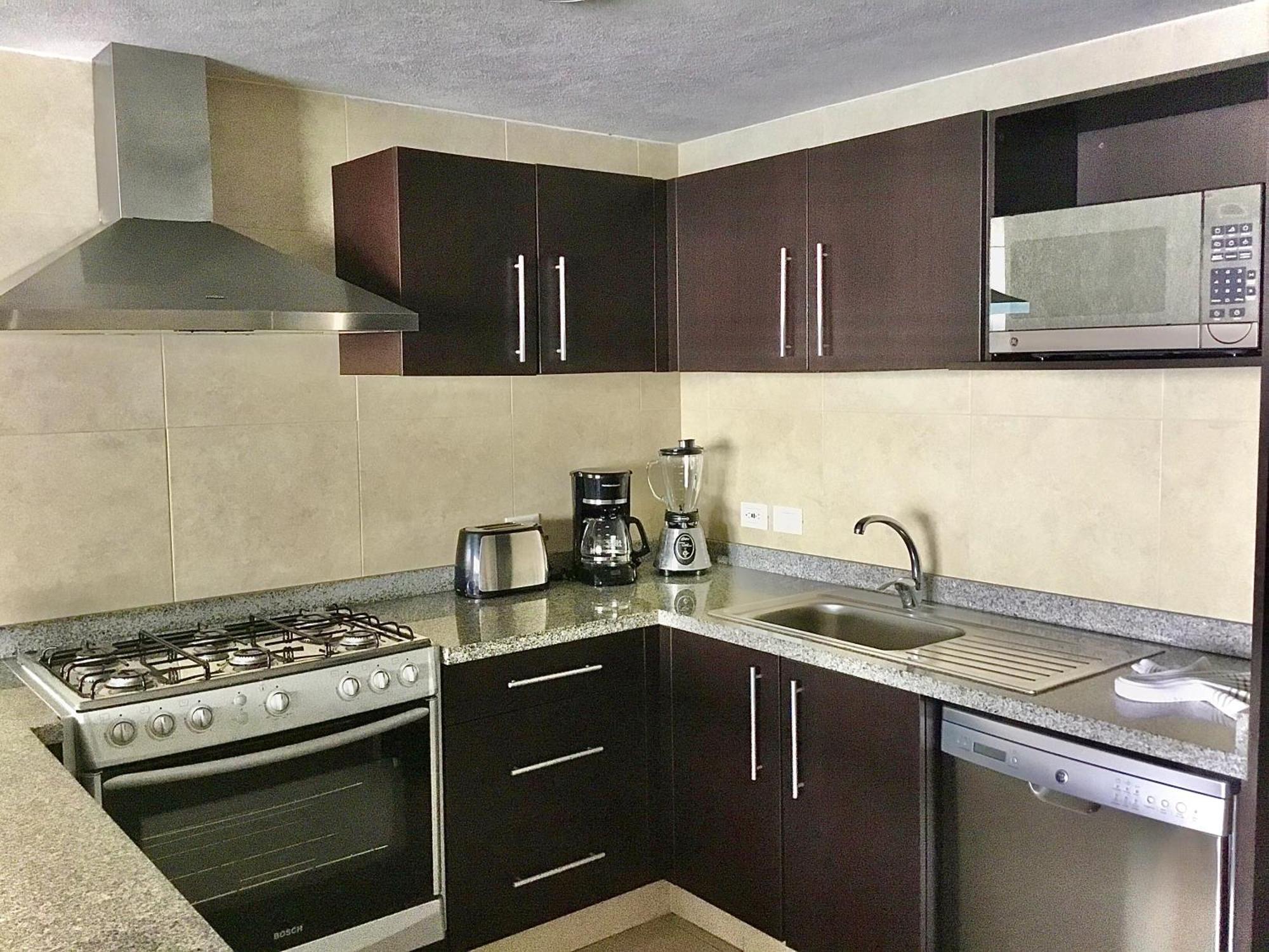 Apartamentos Grand Venetian Пуэрто-Вальярта Номер фото